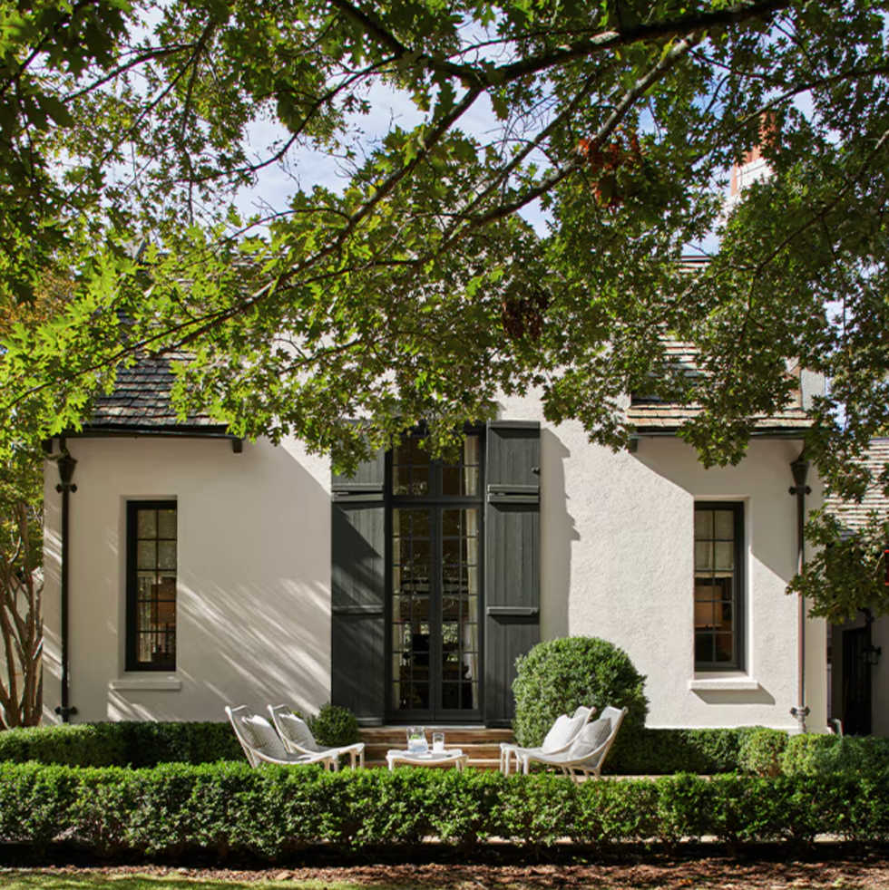house with green shutters and white exterior paint