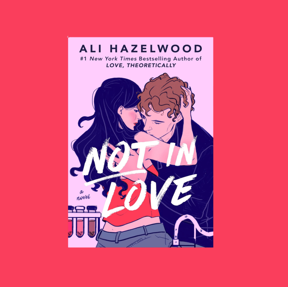 Illustrated couple embracing, with text "Not In Love" on book cover.