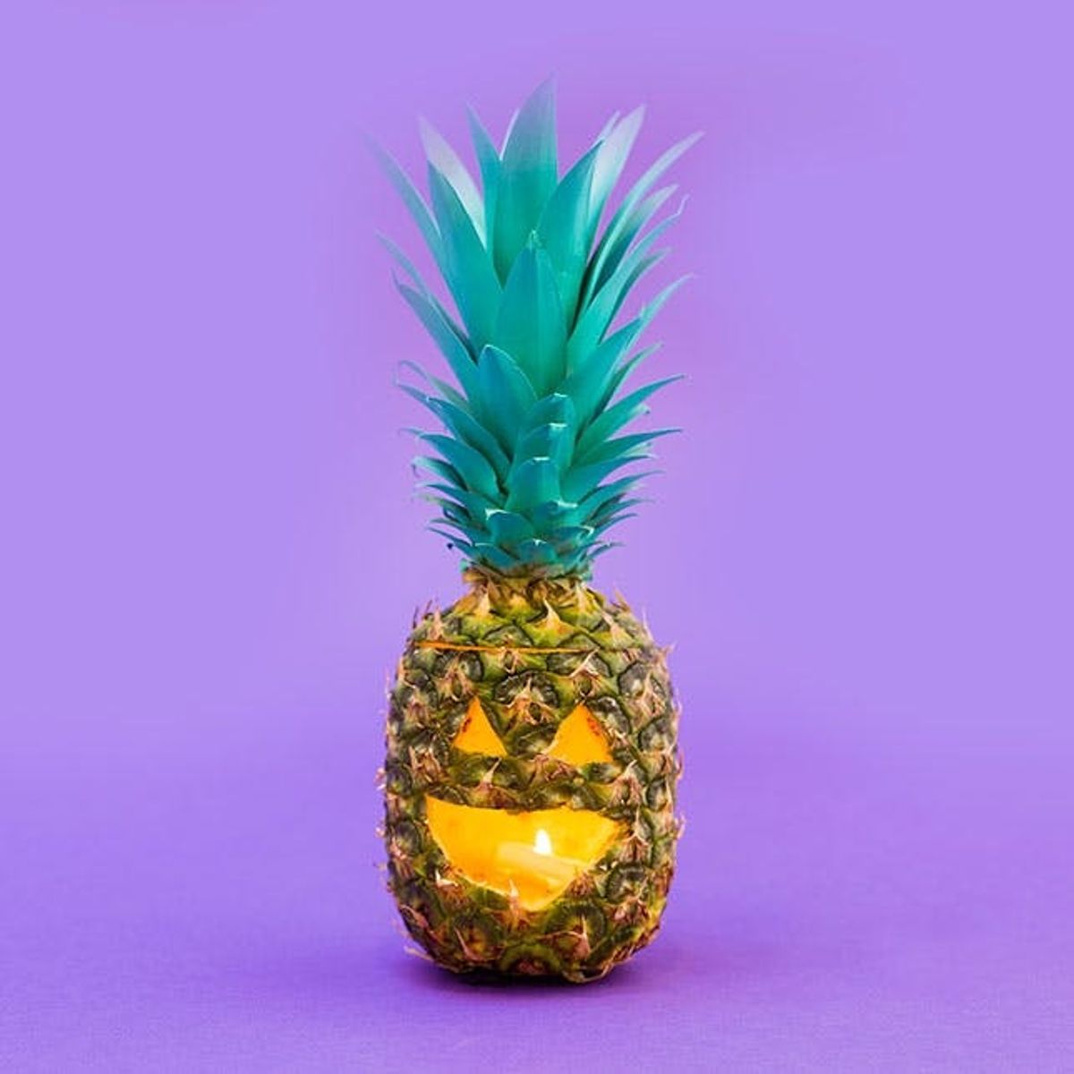 How to Carve Pineapple and Melon Jack-o’-Lanterns This Halloween