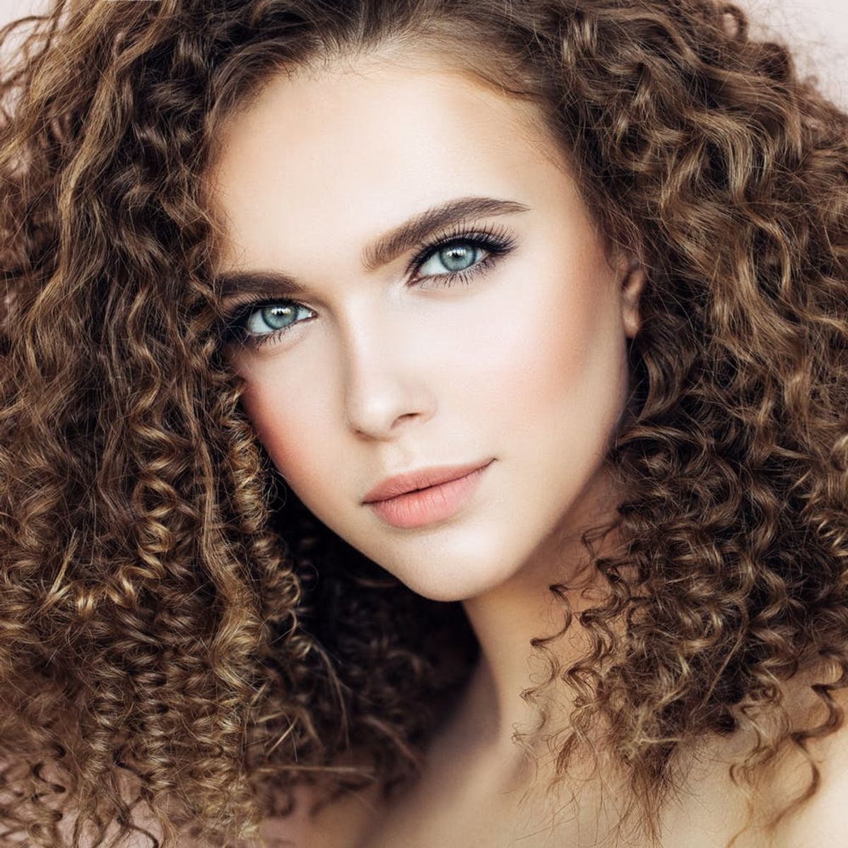 What Is Hair Plopping, and Will It Really Change My Curls?