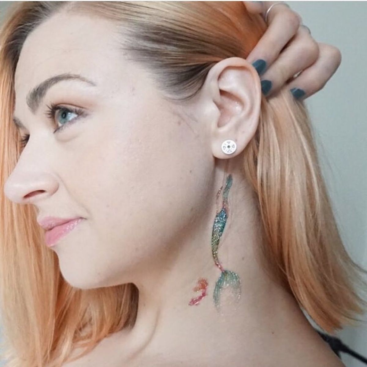 16 Mesmerizing Mermaid Tattoos You’ll Flip For