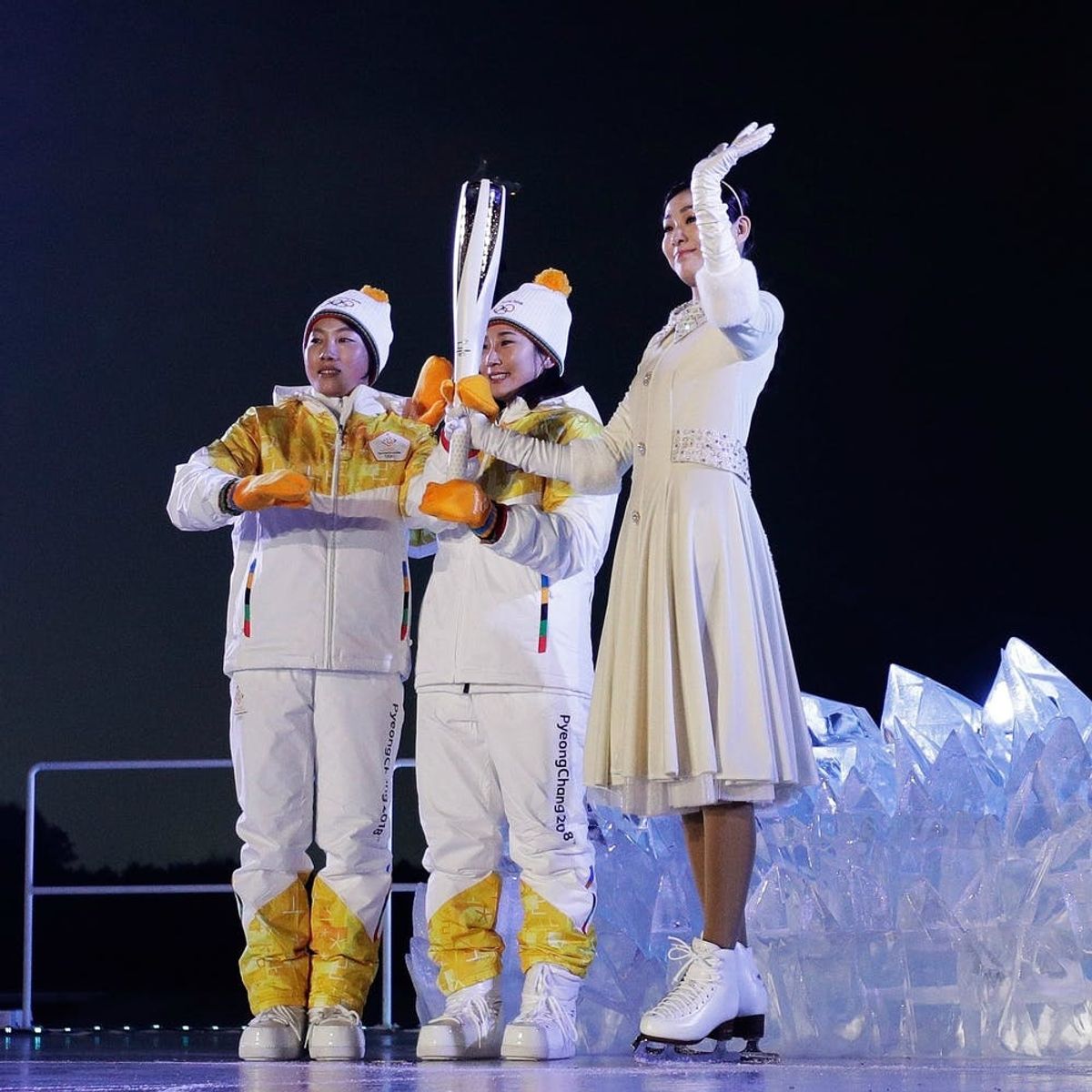 The Story Behind the Two Women Carrying the Olympic Torch Together Will