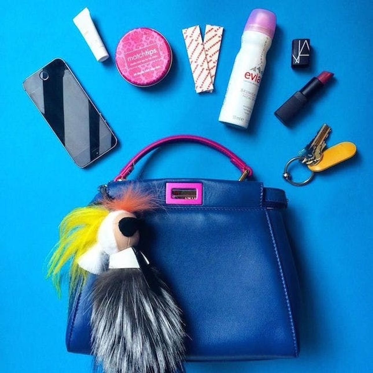 See the #WhatsInYourBag Pics from 17 Style Bloggers