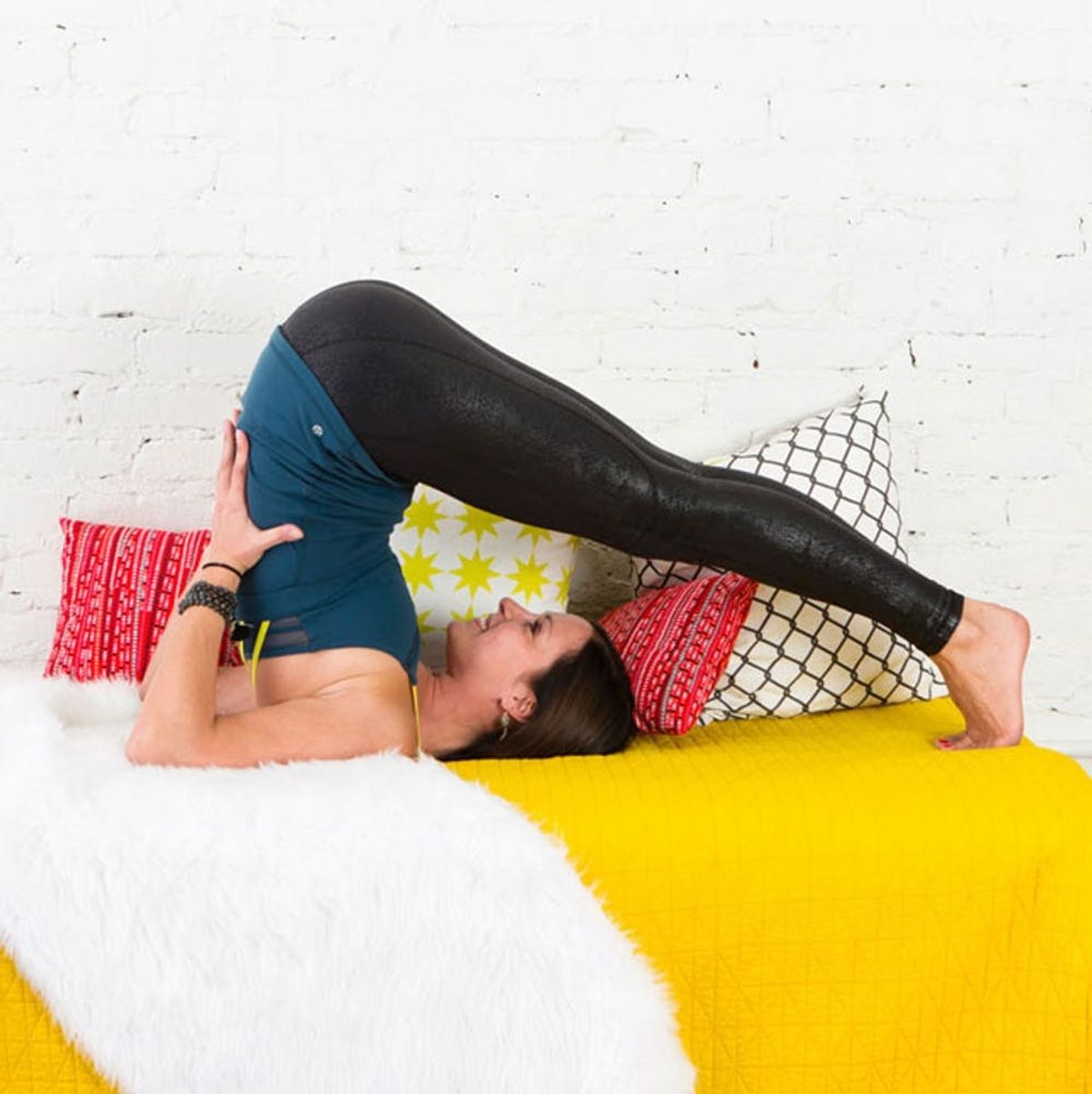 6 Lazy Girl Yoga Poses You Can Do Without Leaving Your Bed