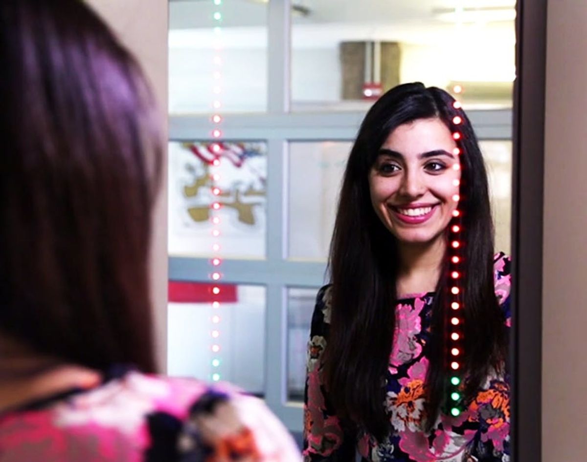 Ready for Your Selfie? This Mirror Snaps ‘Em When You Smile!