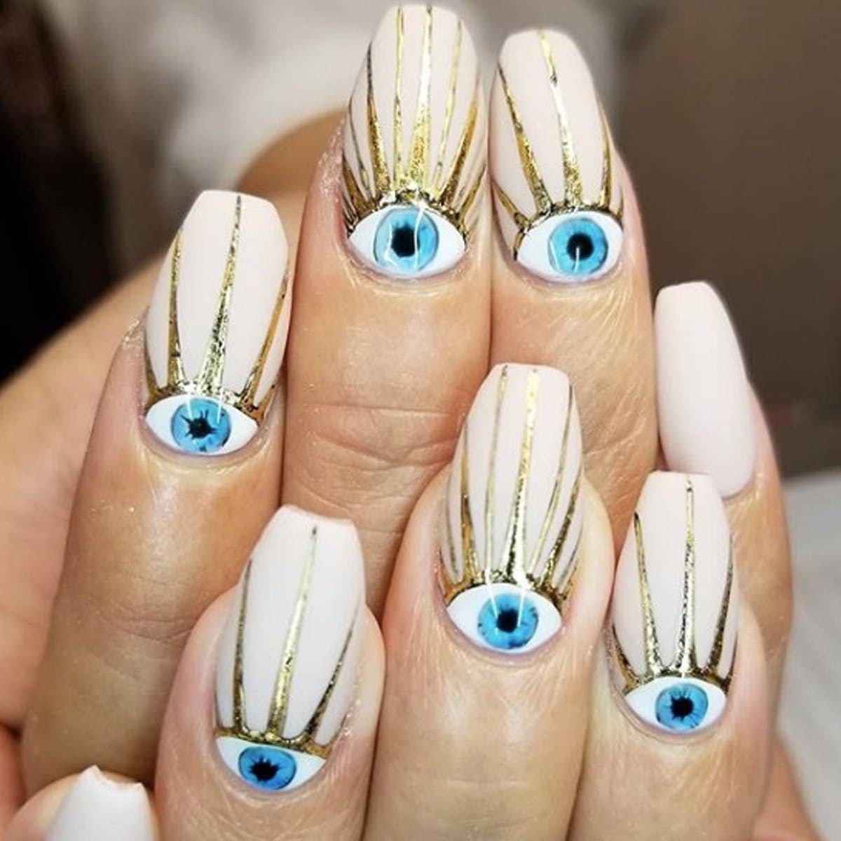 15 Evil Eye Manicures to Ward Off Bad Vibes