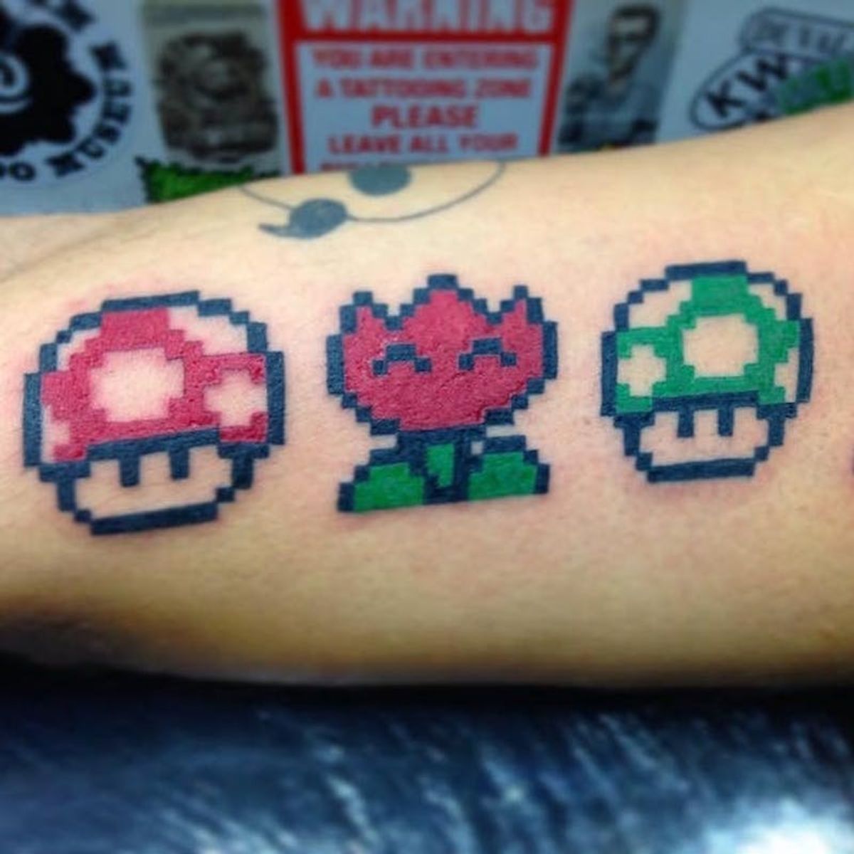 12 Pixelated Tattoo Ideas for a ’90s Twist on Your Next Ink