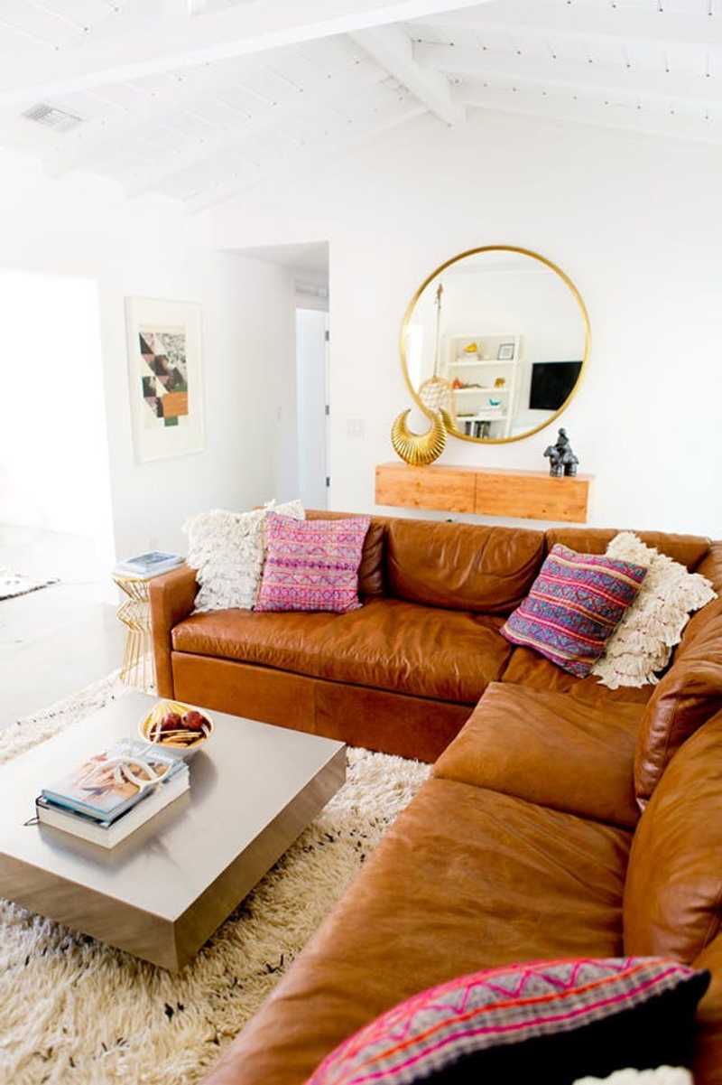 how to dress up a leather couch 9 Ways Rock the Sofa Trend That's Taking Over Instagram brown leather couch decor ideas