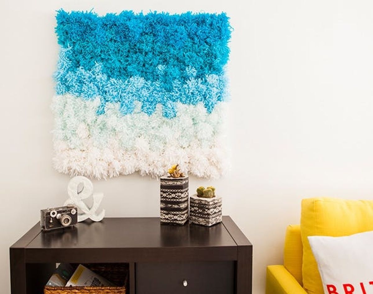A Pom Pom Rug, Wall Hanging and Table Cover in One!