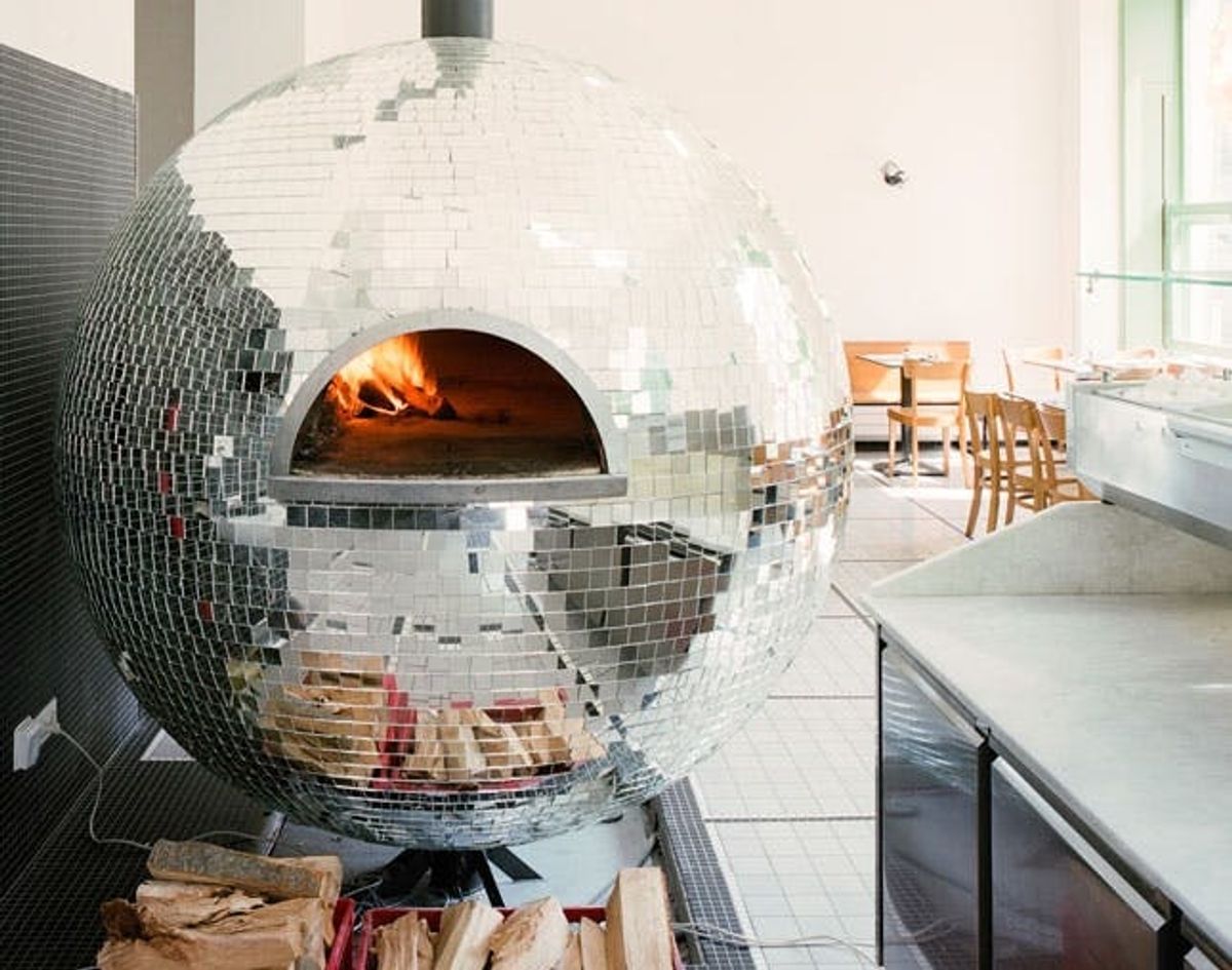 Made Us Look: The Completely Unbelievable Disco Ball Pizza Oven