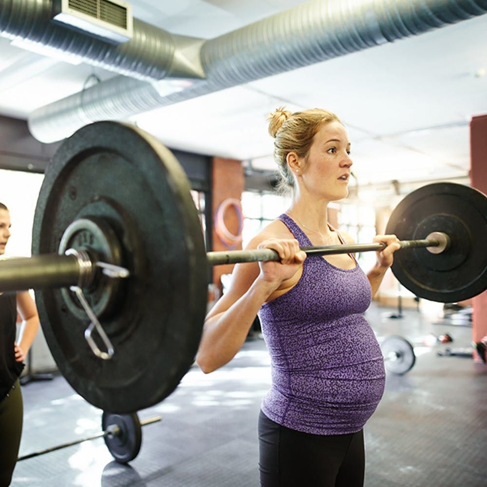 Pregnant Woman Lifting Weights