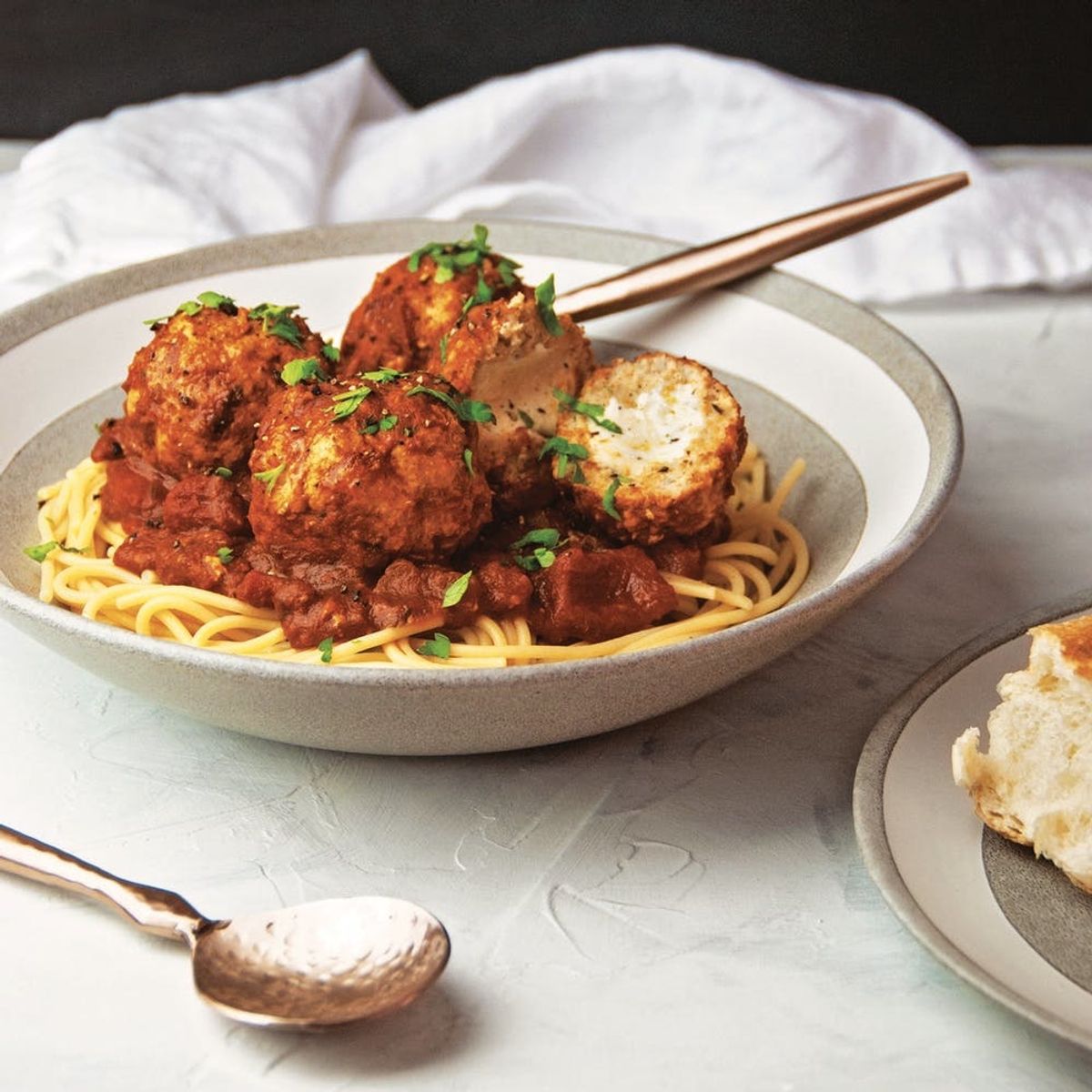 Mozzarella-Stuffed Chicken Meatballs Are Easy, Cheesy, and Slow-Cooked