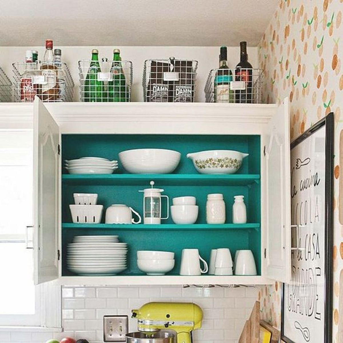 10 Genius Ways to Use That Awkward Space Above Your Kitchen Cabinets