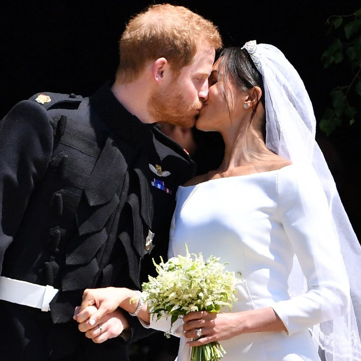 Prince Harry and Meghan Markle Share Their First Kiss as Newlyweds