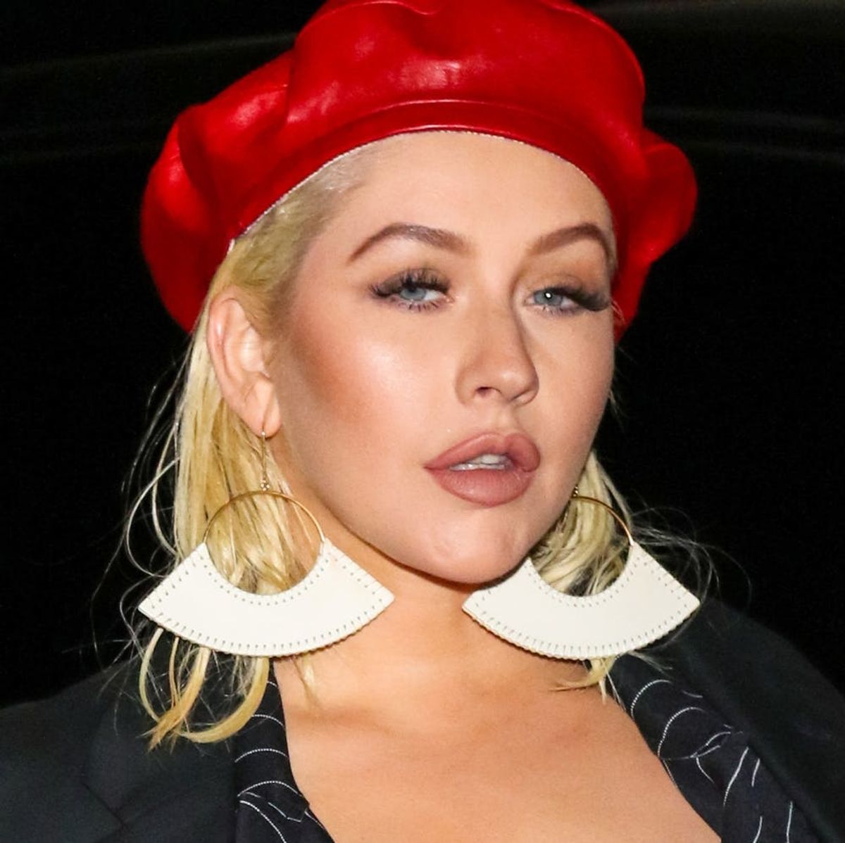 Christina Aguilera Goes Without Makeup to Get a New Piercing