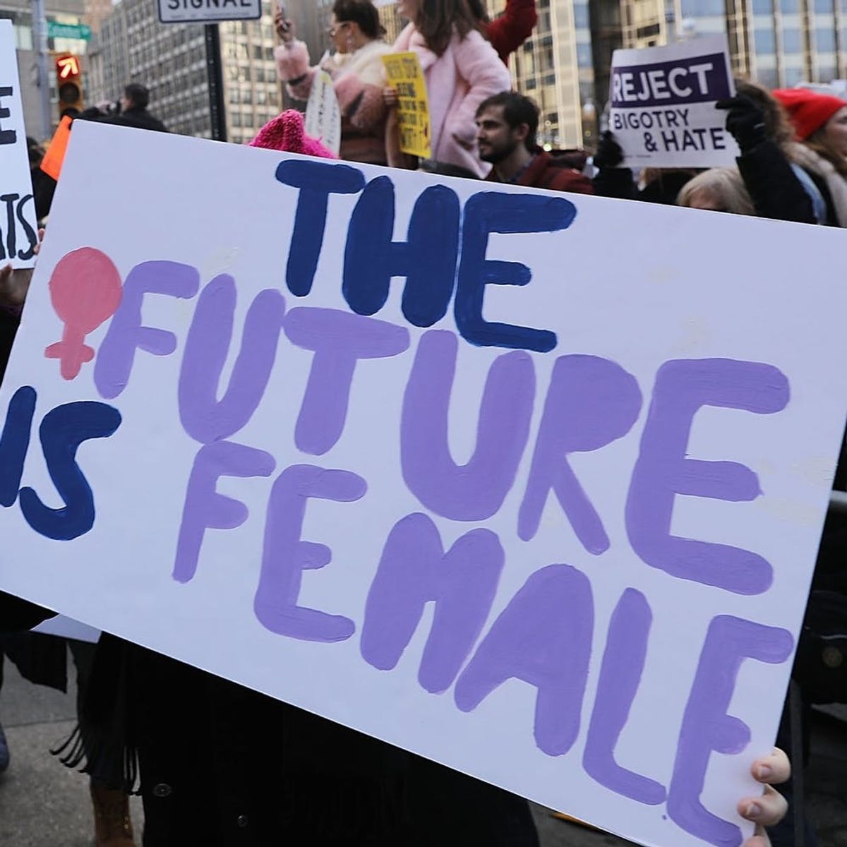These Women’s March Moments and Signs Will Inspire You to Take Action in 2018