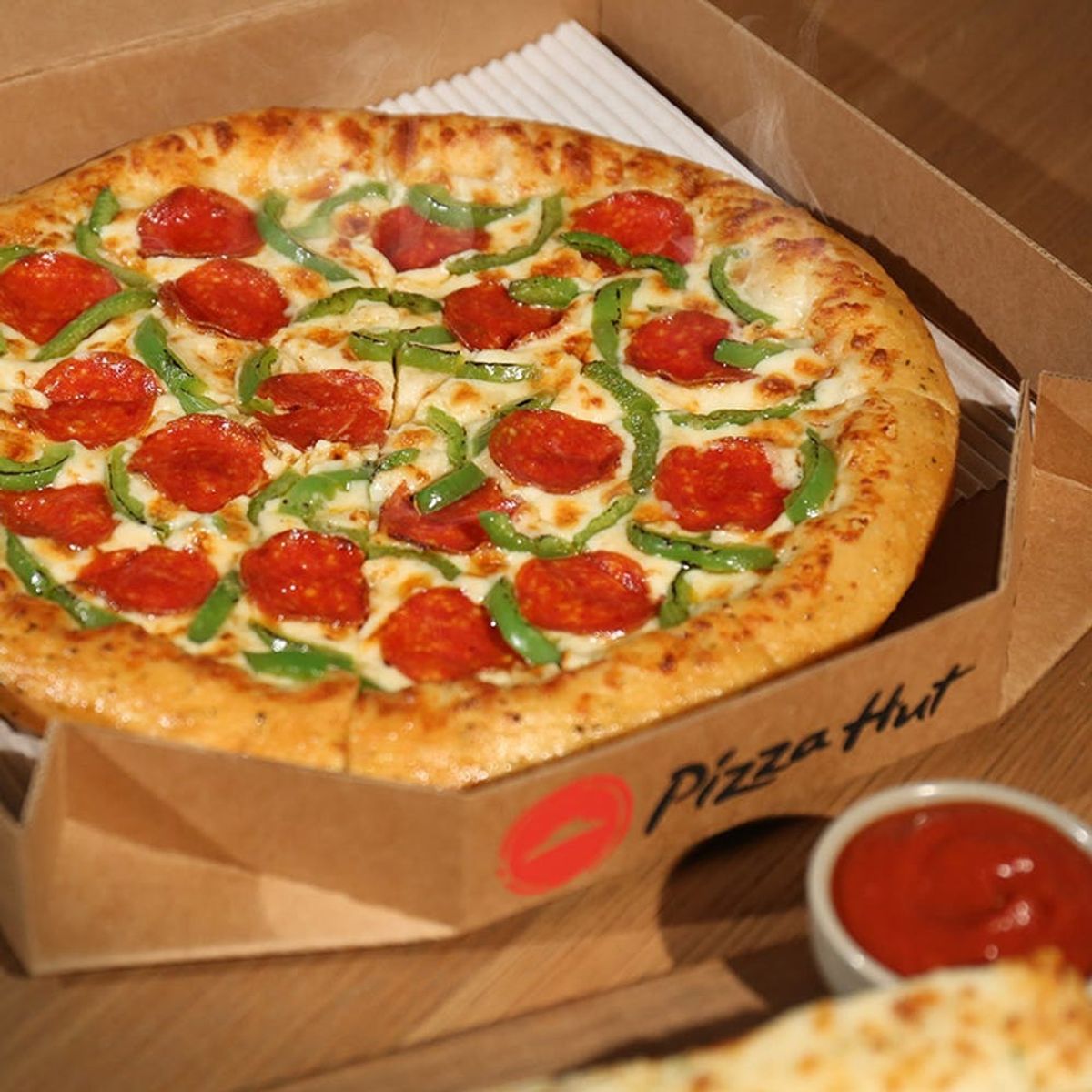 Pizza Hut Is Giving Us the Gift of Scrumptious Savings This Week