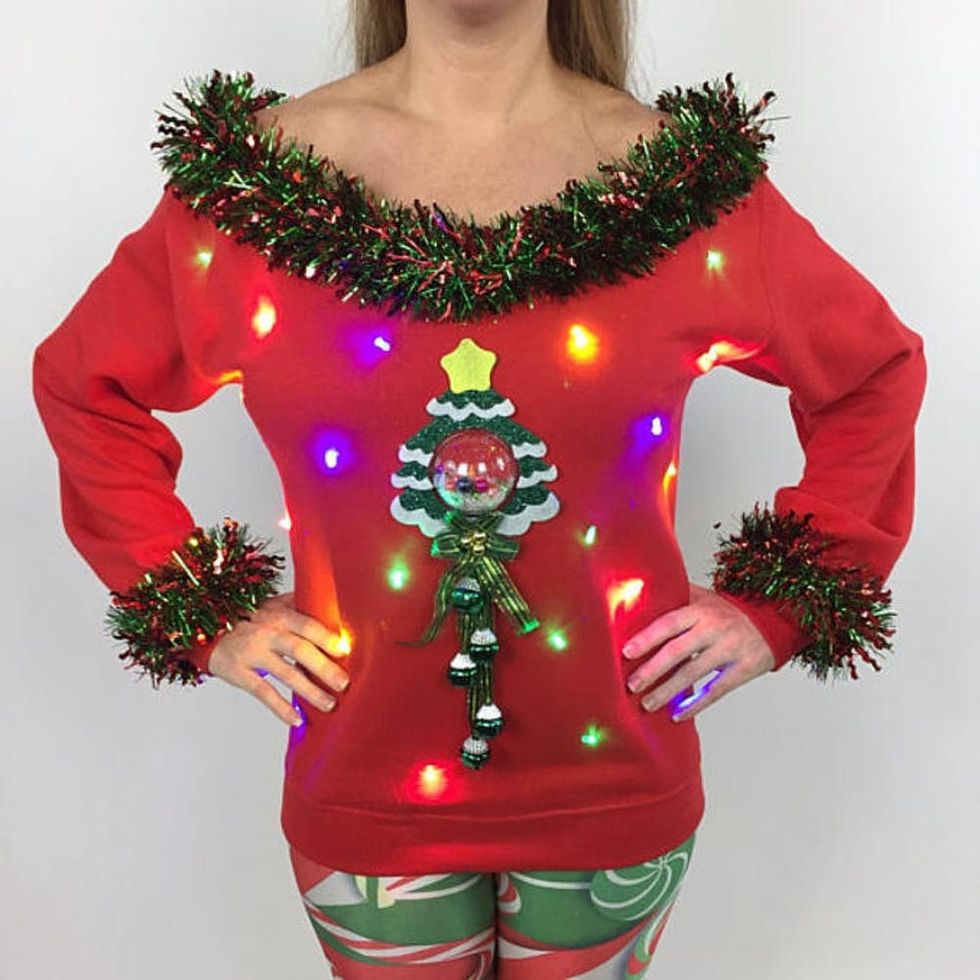 The Ugly Holiday Sweater for You, According to Your Zodiac Sign - Brit + Co
