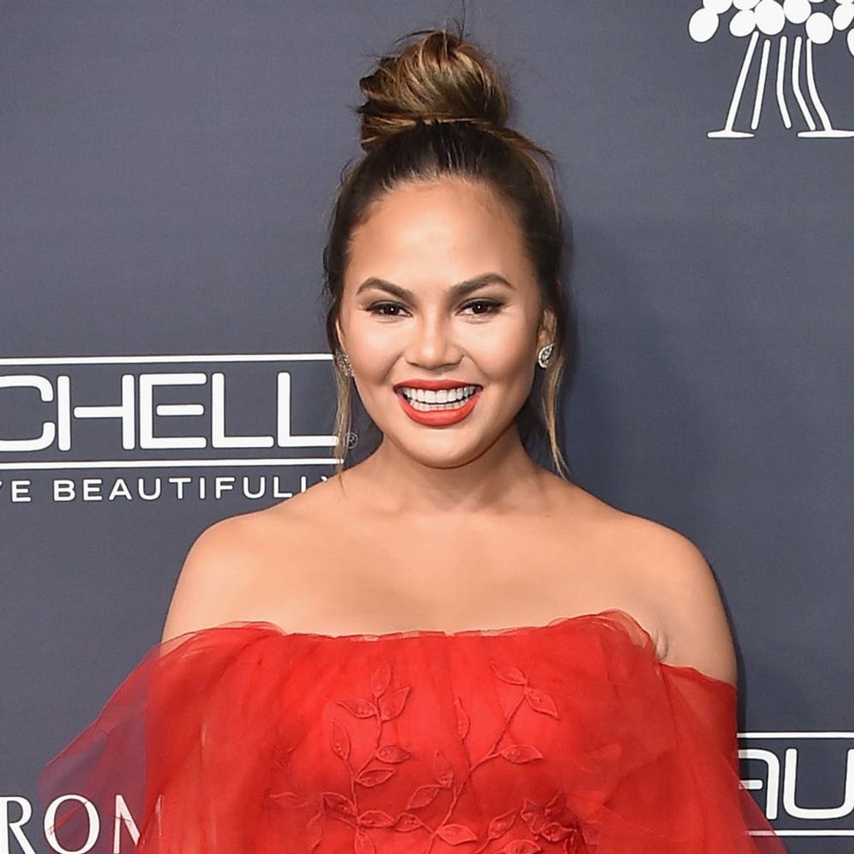 Chrissy Teigen Snaps Her First Baby Bump Selfie After Announcing She’s Pregnant