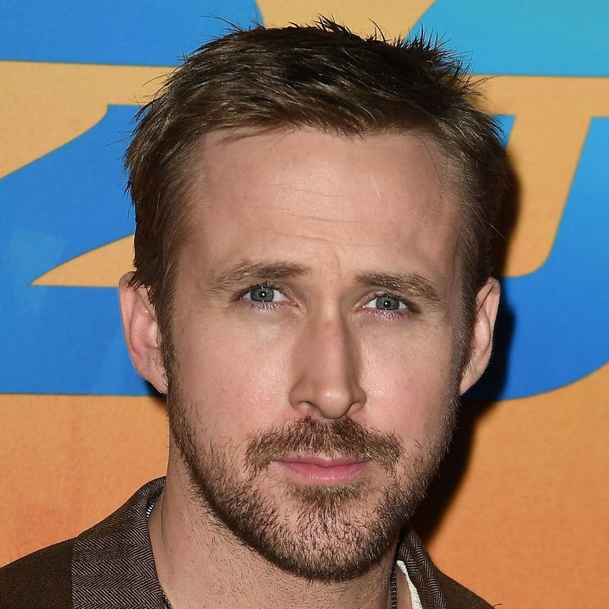 The Meaning Behind Ryan Gosling’s Necklace Will Melt Your Heart