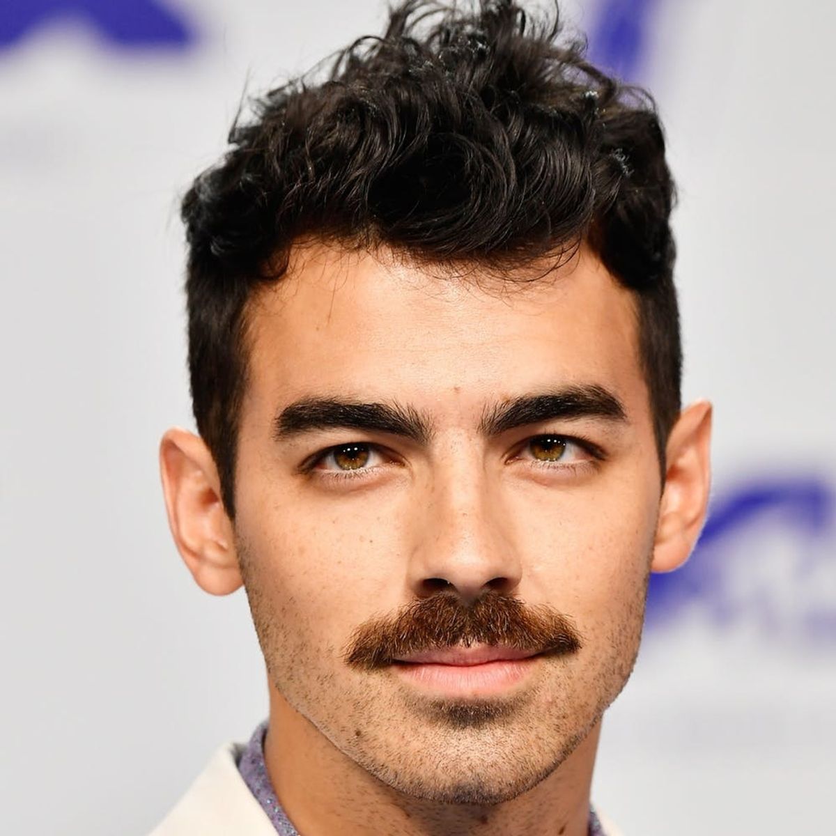 Joe Jonas Just Debuted a Massive Mustache at the 2017 MTV VMAs and Twitter Is Freaking. Out.