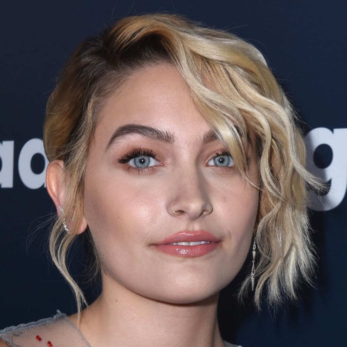 Paris Jackson Just Schooled Us All on How to Wear a Cape in a Colorful Peacock Dress