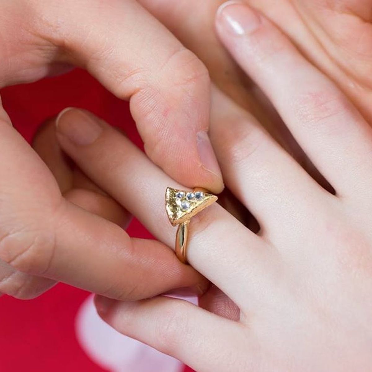 Here’s How to Win a Pizza-Shaped Gold and Diamond Engagement Ring from Domino’s