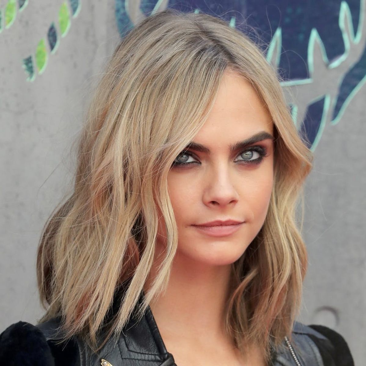 You *NEED* to See Cara Delevingne’s Latest Creepy Cool Tat
