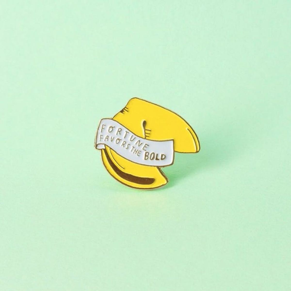 These New Celeb-Designed Inspirational Pins Just Became Your Newest Closet Staple