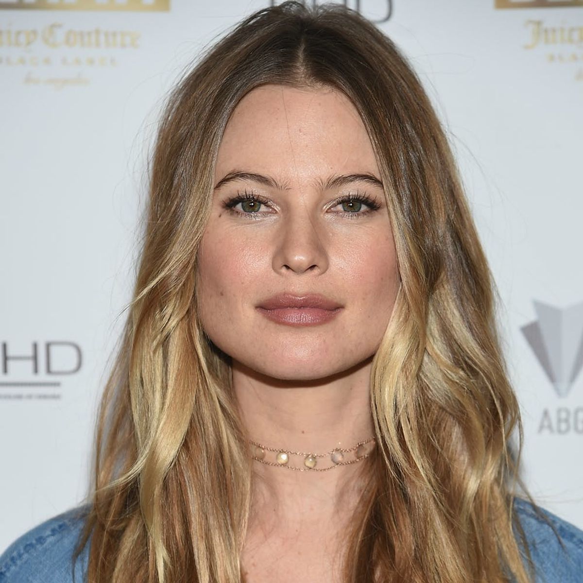 Behati Prinsloo Uses Her Baby Bump As a Floatation Device in This Hilarious Snap