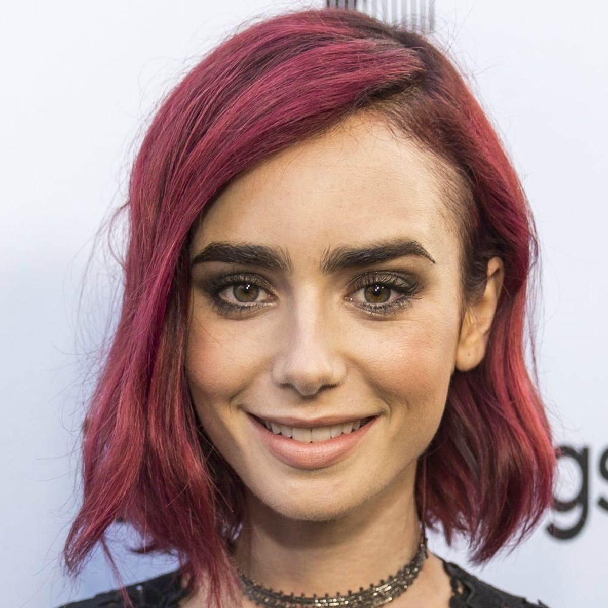 Lily Collins’ Edgy Style Transformation Is Complete With This Rad New Body Art