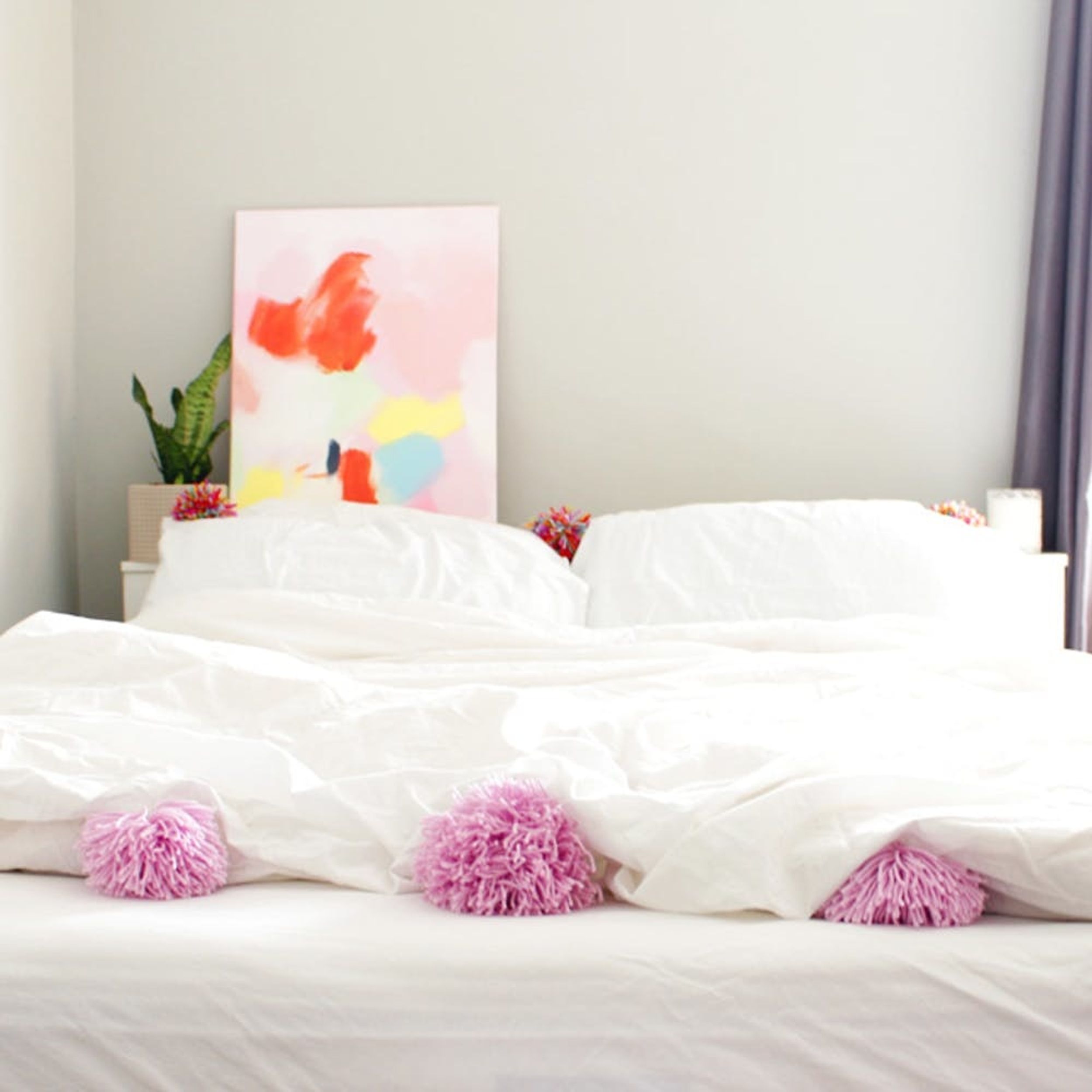 Upgrade Your Bedding With DIY Pom Pom Pillows and Duvet