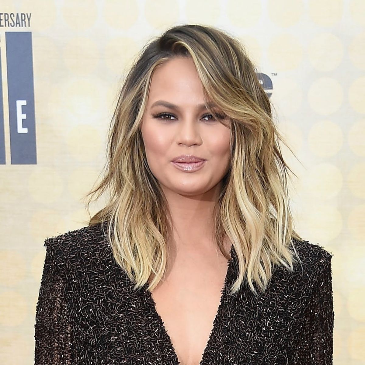 Chrissy Teigen May Have Just Won First Prize for the Best Disney Photo Ever