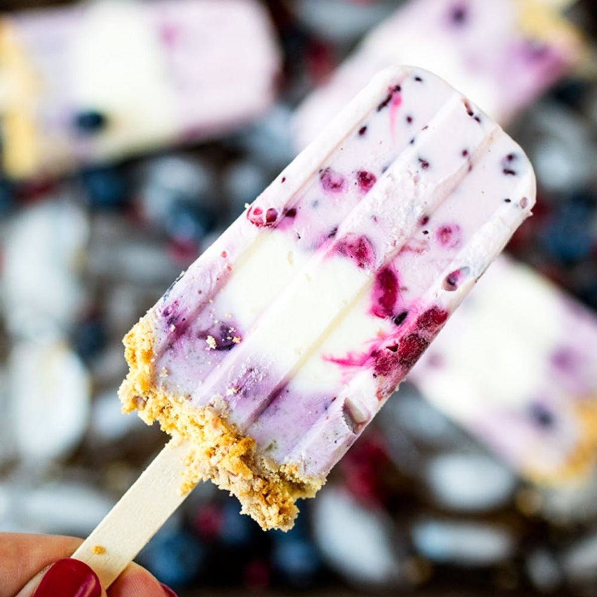 These Blueberry And Pomegranate Cheesecake Popsicles Are Perfect for Memorial Day