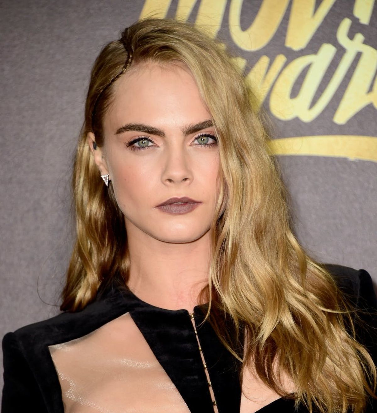 The Meaning Behind Cara Delevingne’s Side Tattoo Is Super Touching