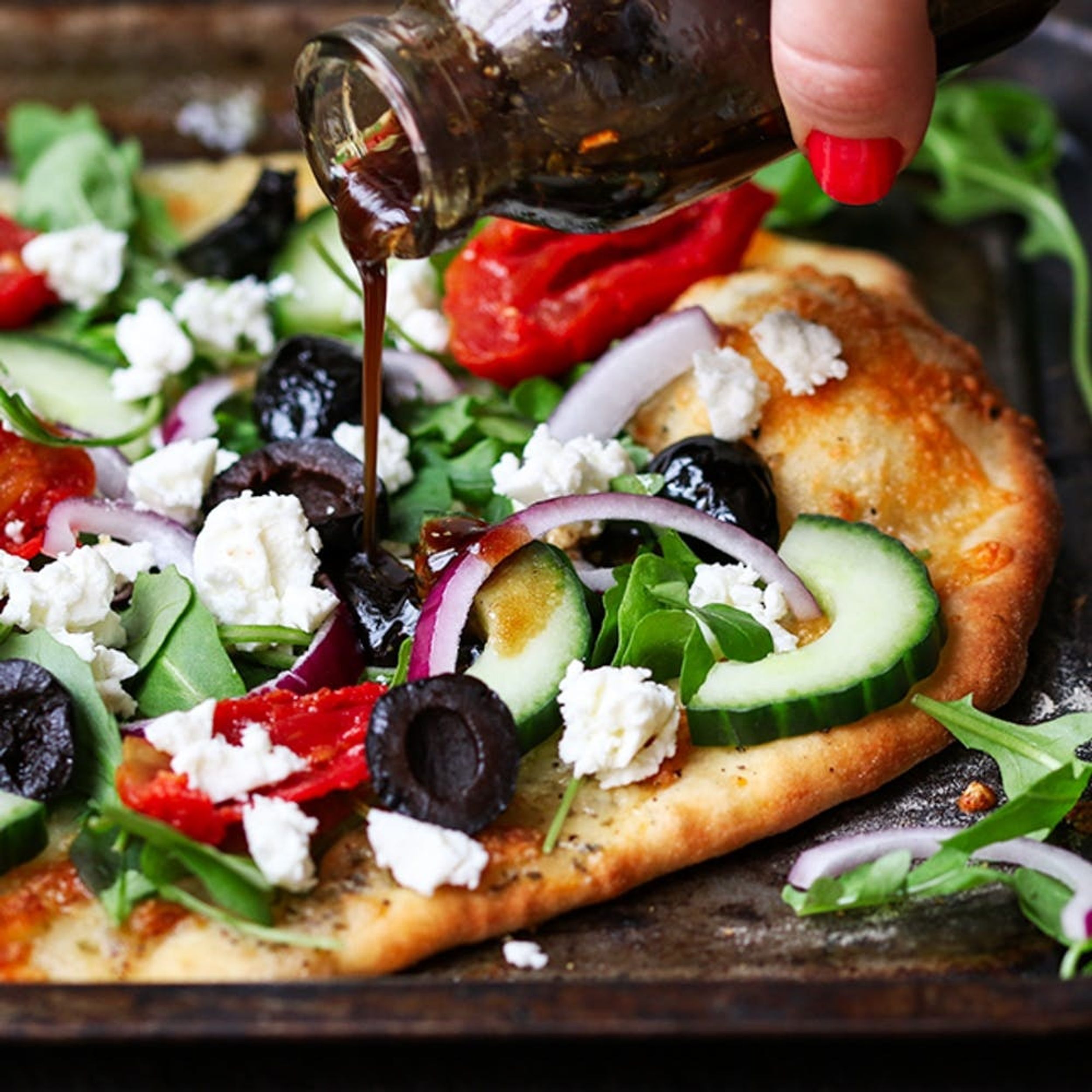 Lighten up Your Favorite Junk Food With This Greek Salad Pizza Recipe