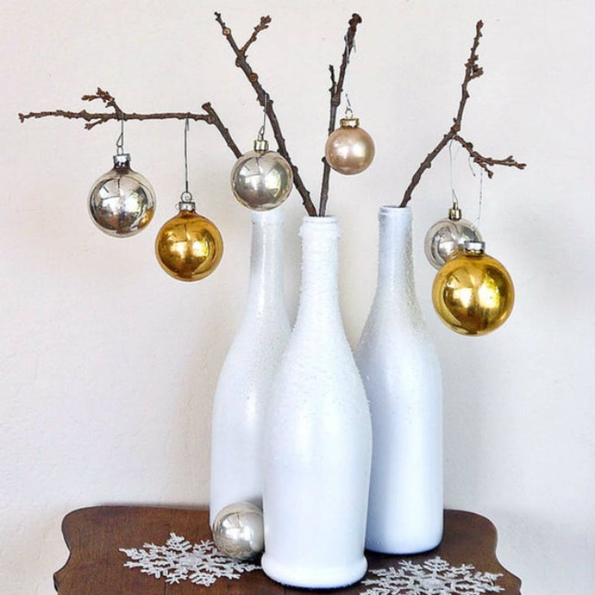 10 Ways to Upcycle Your Empty Wine Bottles for the Holidays