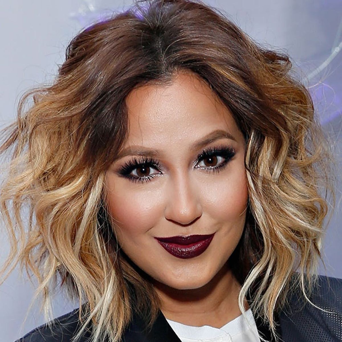 Adrienne Bailon Uses This Weird Skincare Product on Her Hair (+ It Works!)