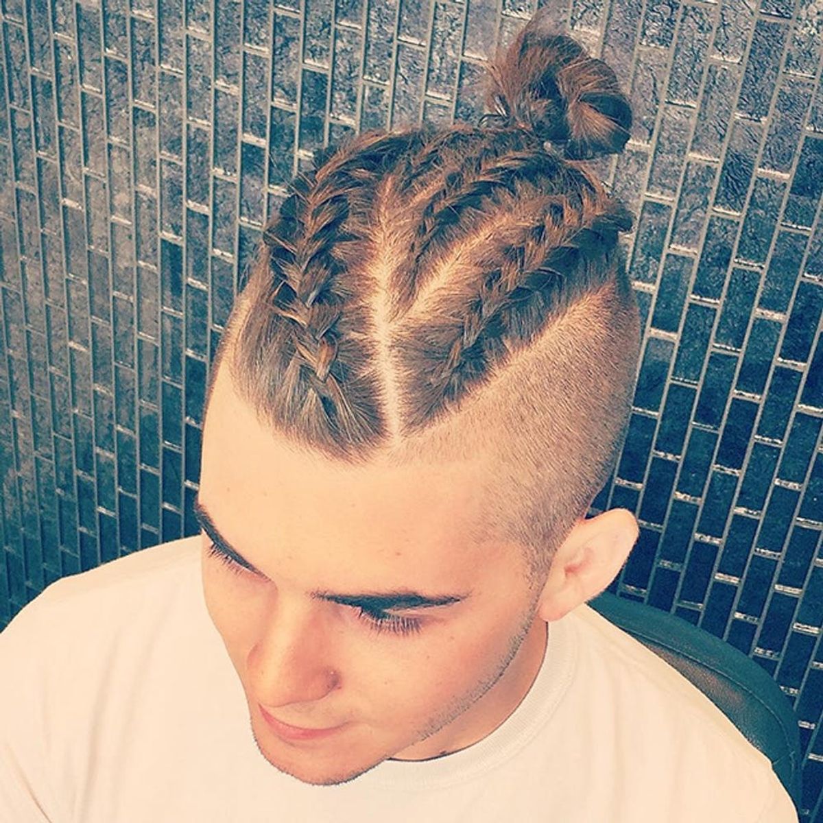 The Latest Men’s Hair Trend Is the New Man Bun