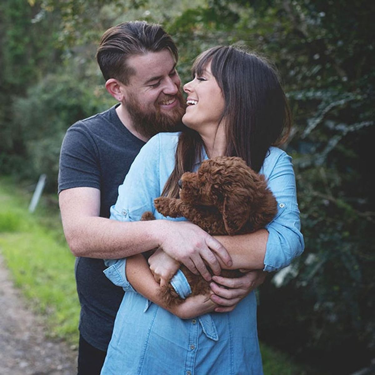The Reason Why This Couple Did a Newborn Photo Shoot With Their Puppy Is Genius