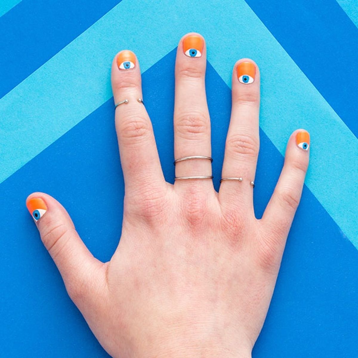 These DIY Evil Eye Nails Take Half Moon Manis to the Next Level