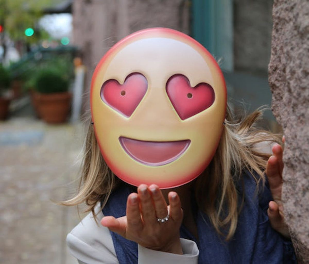 These $5 Emoji Masks Are the Easiest Halloween Costume EVER