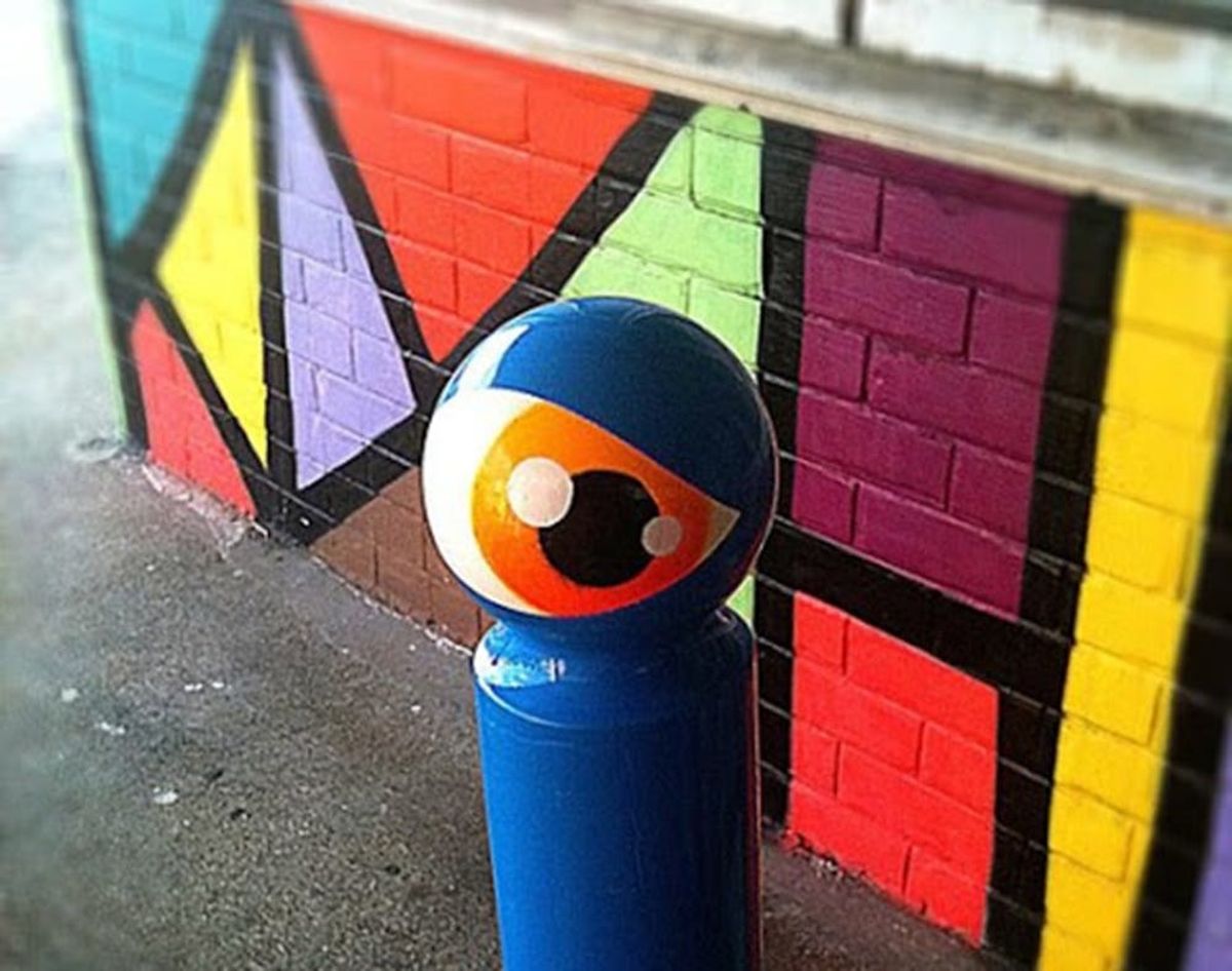 How One Street Artist Is Turning Signs into Cyclops