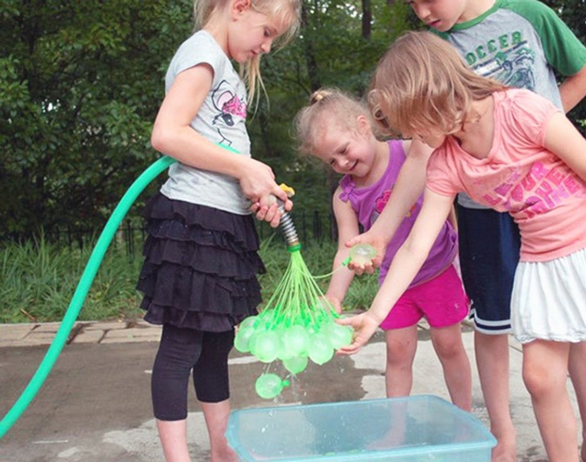 This Dad Invented a Way to Stage the Most Epic Water Balloon Fight