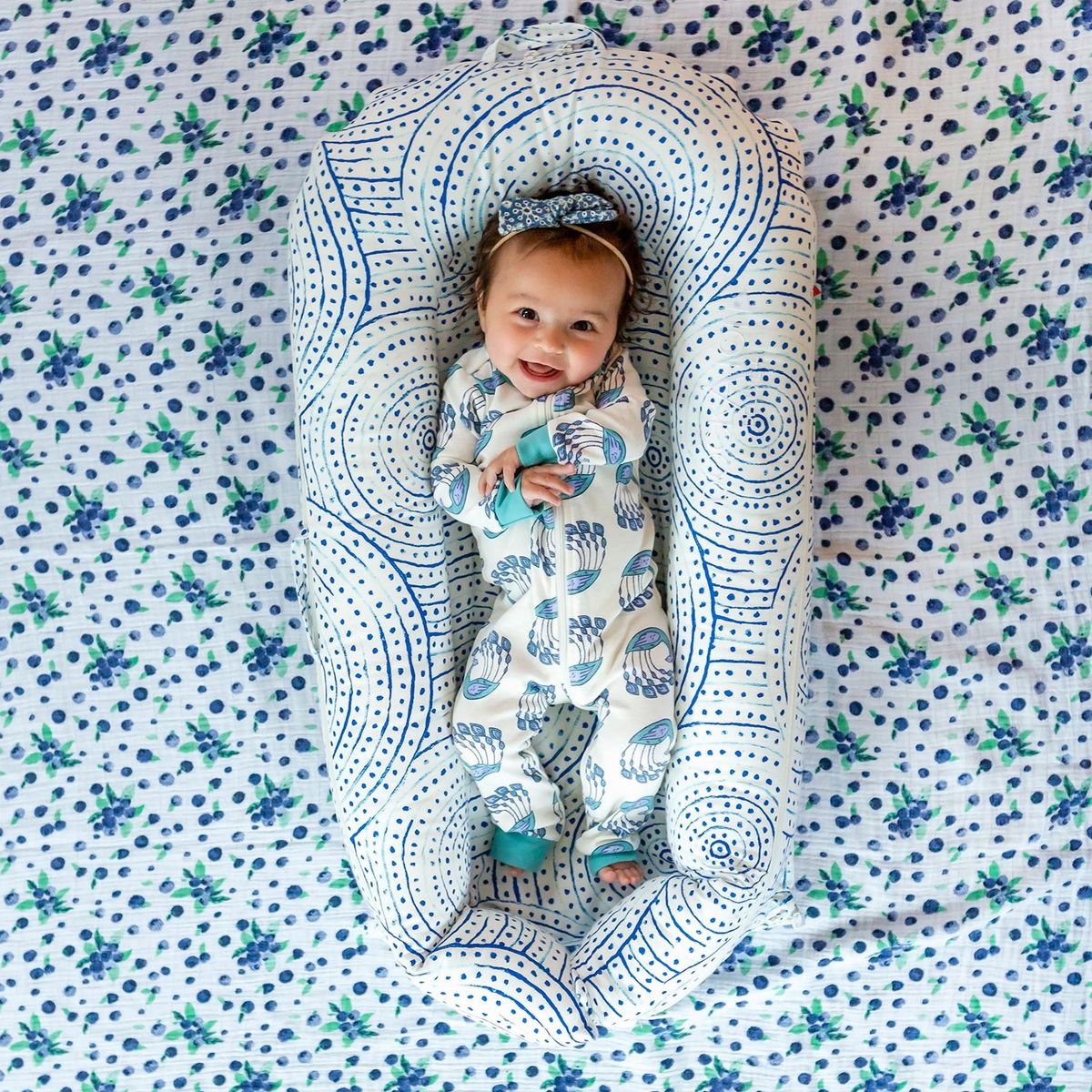 This Colorful Baby Lounger is Essential for Adventurous New Parents