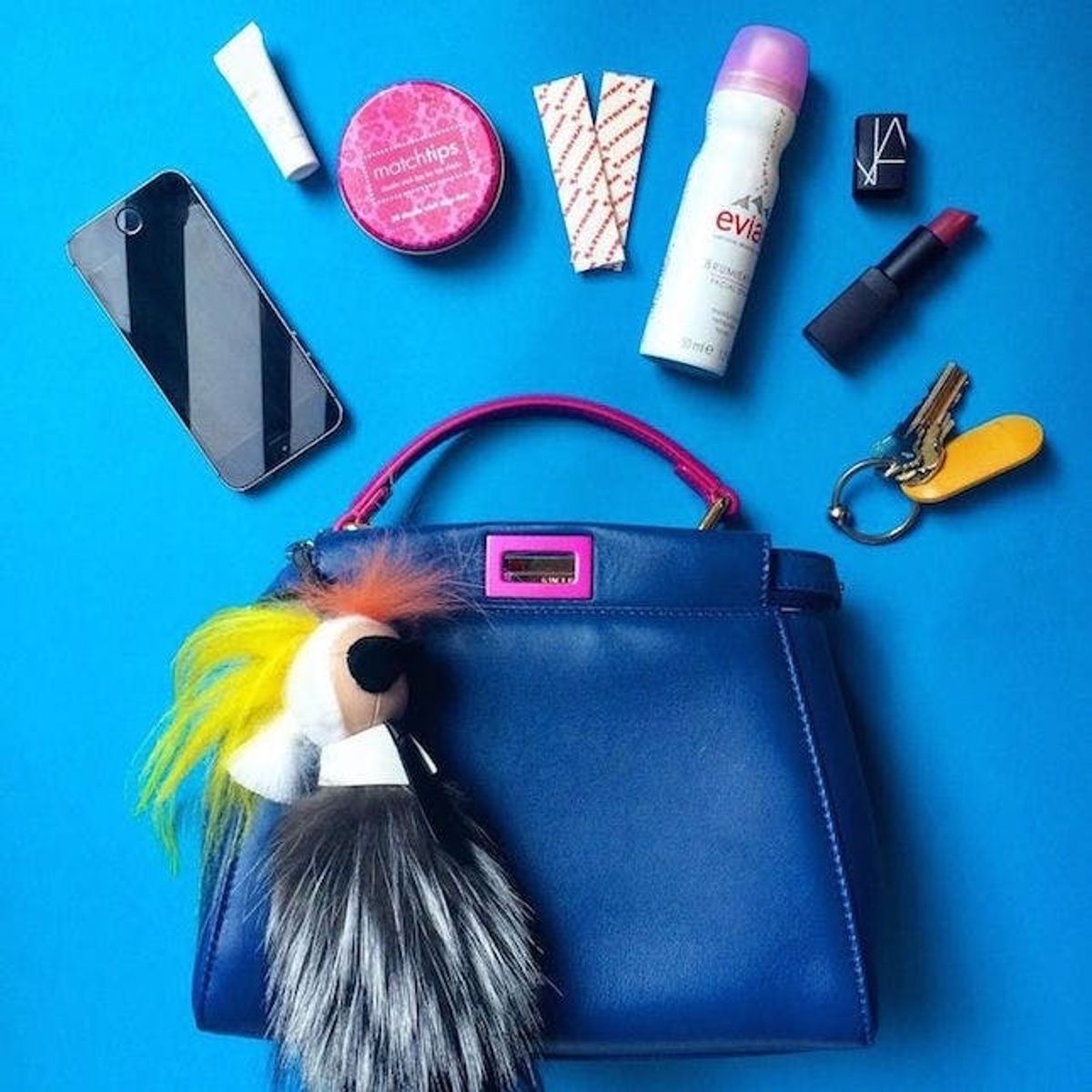 See the #WhatsInYourBag Pics from 17 Style Bloggers