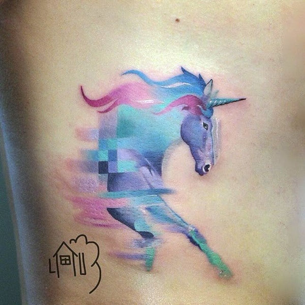 This Tattoo Artist Incorporates Pixels into His Beautiful Designs