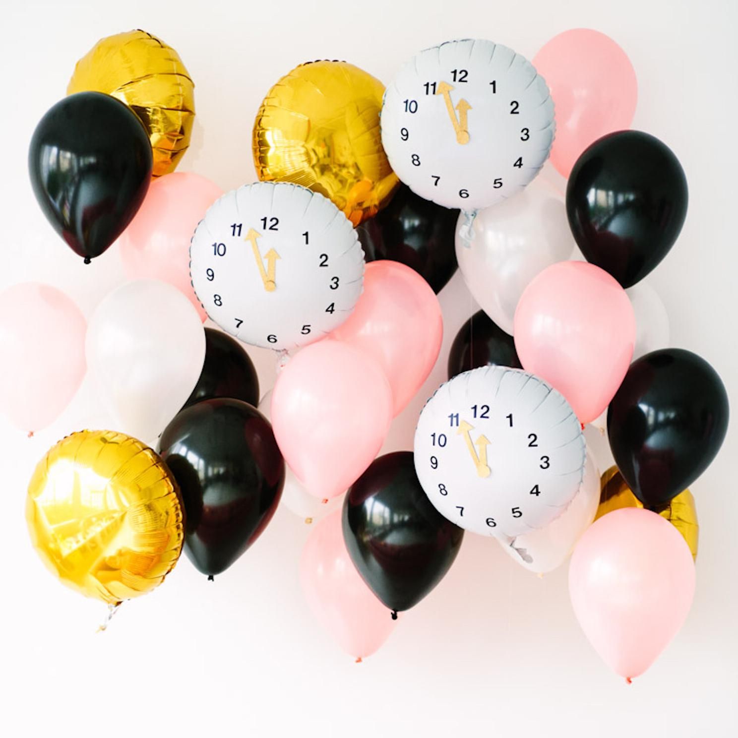 diy black, pink, and gold clock balloons New Year’s Eve Decorations