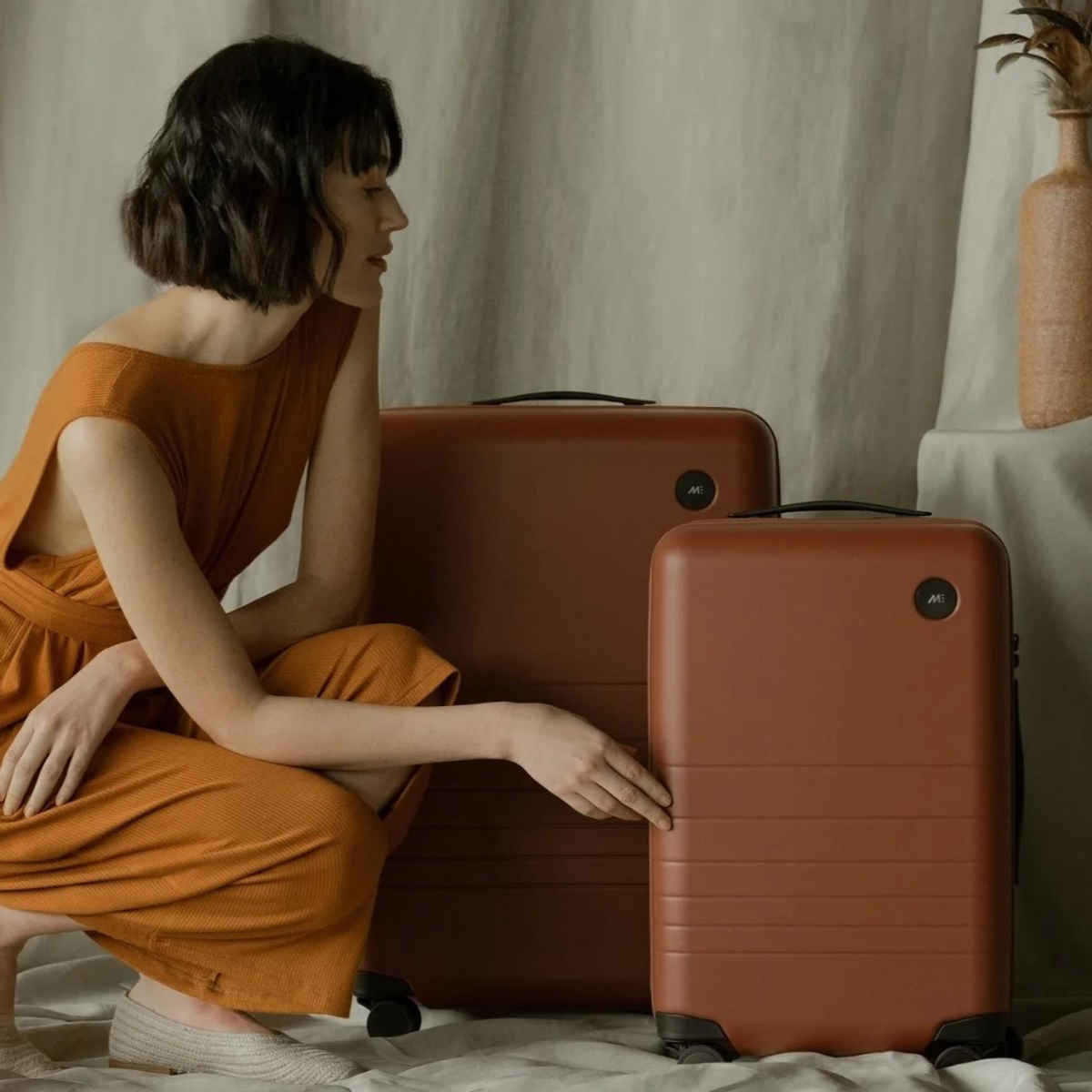 8 Chic Small Rolling Suitcases To Navigate The Airport Without Breaking A Sweat