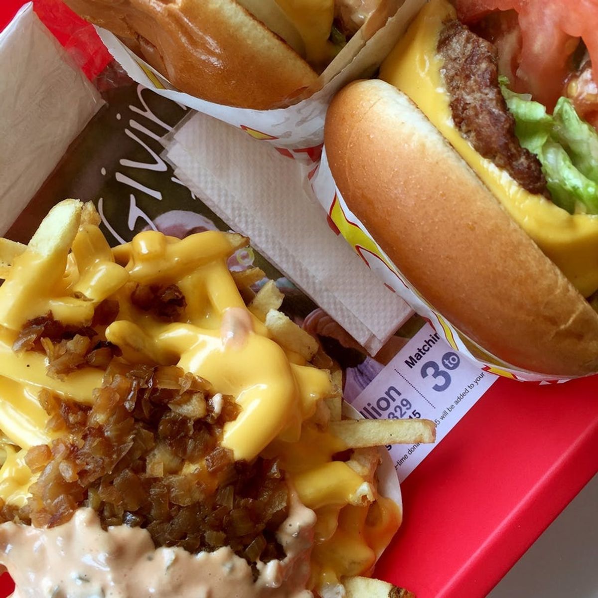 In-N-Out Animal Style is mustard grilled and features extra spread (AKA Thousand Island special sauce), pickles, and grilled, caramelized onions.